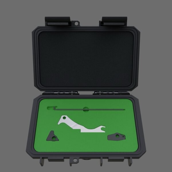 An open black hard plastic case with green foam displays the Diablo Trigger T.A.R.S., featuring a metal hook, a silver bottle opener-shaped tool, and two small black metal components. The background is gray.